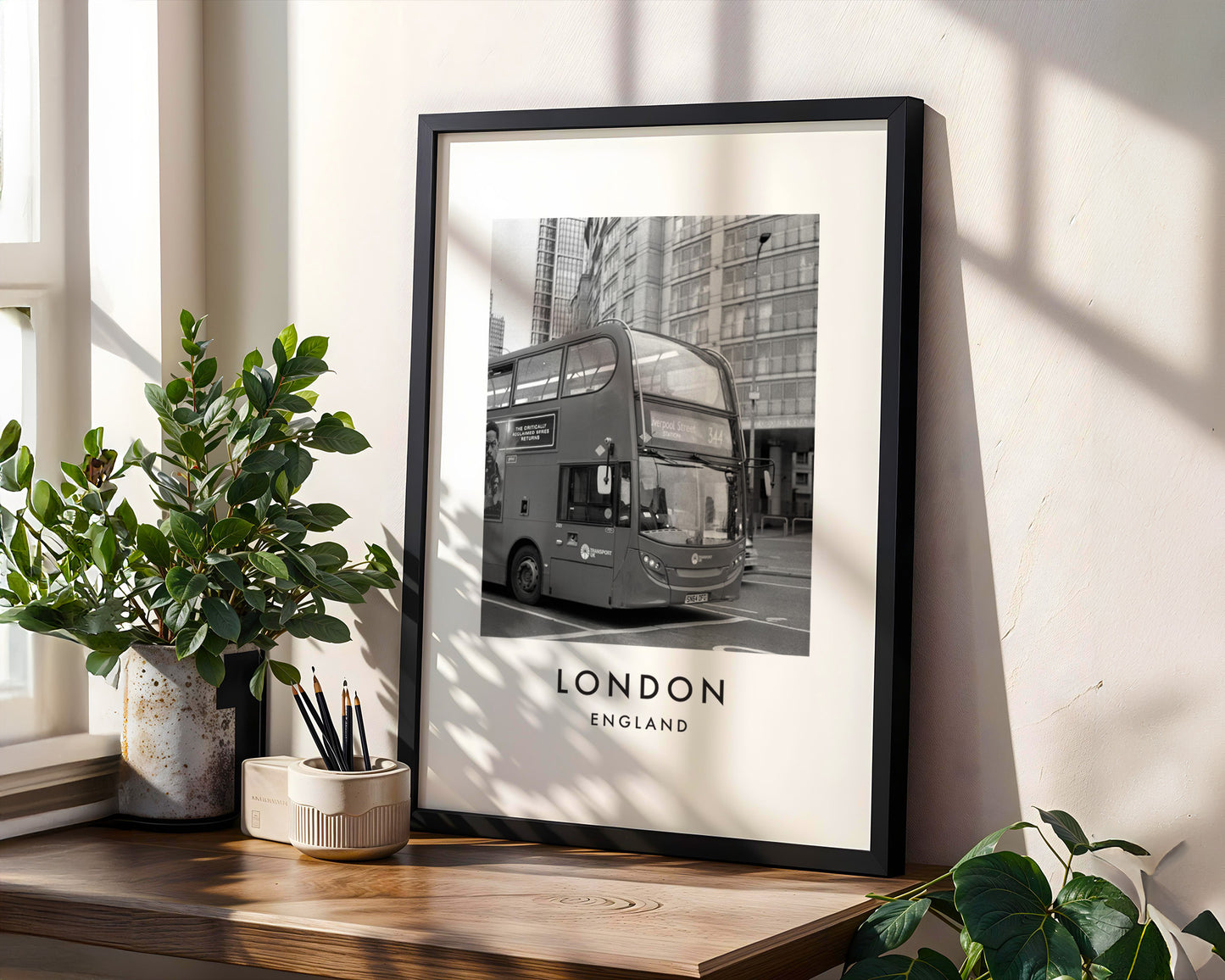 London Bus Black and White City Street - London analogue photography poster print in modern room setting