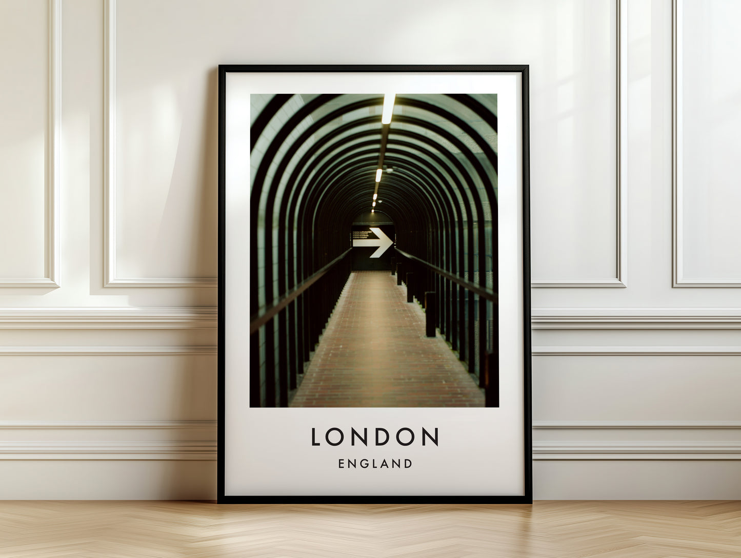Pedestrian Tunnel Repeating Arches Arrow Sign - London analogue photography poster print on white panelled wall