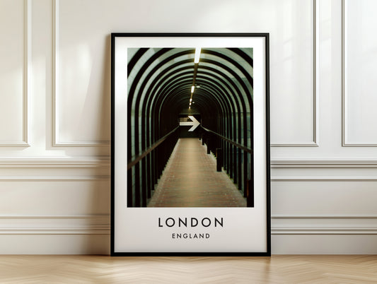 Pedestrian Tunnel Repeating Arches Arrow Sign - London analogue photography poster print on white panelled wall