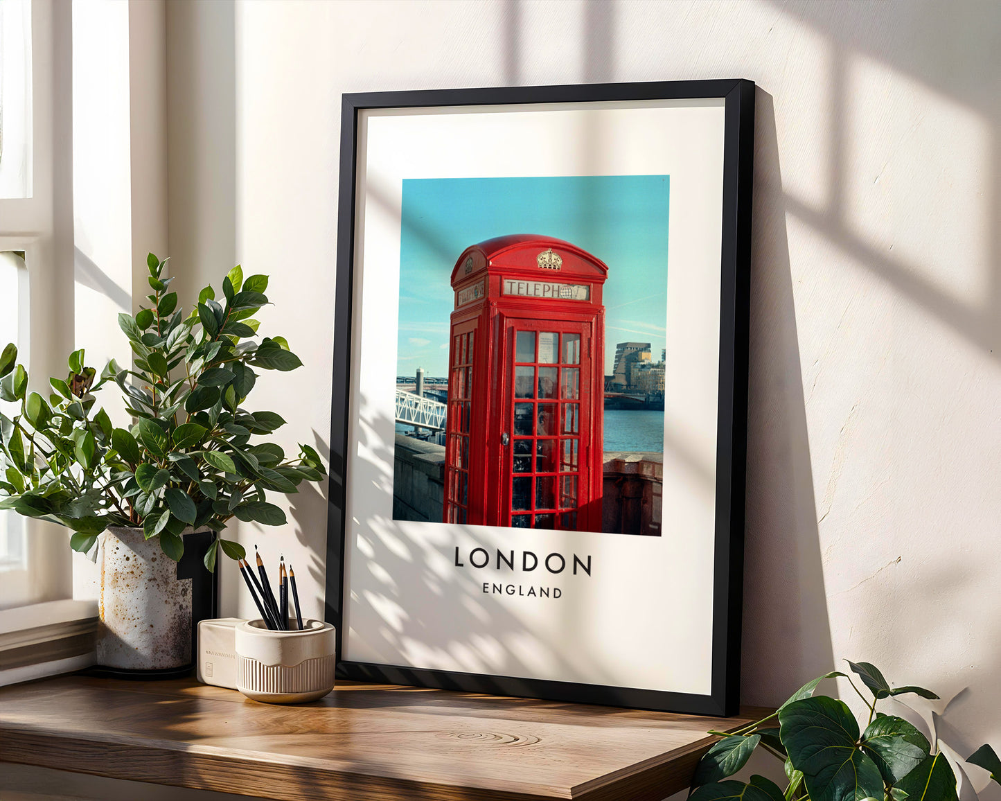 Red Telephone Box Close Up Thames Bridge - London analogue photography poster print in modern room setting